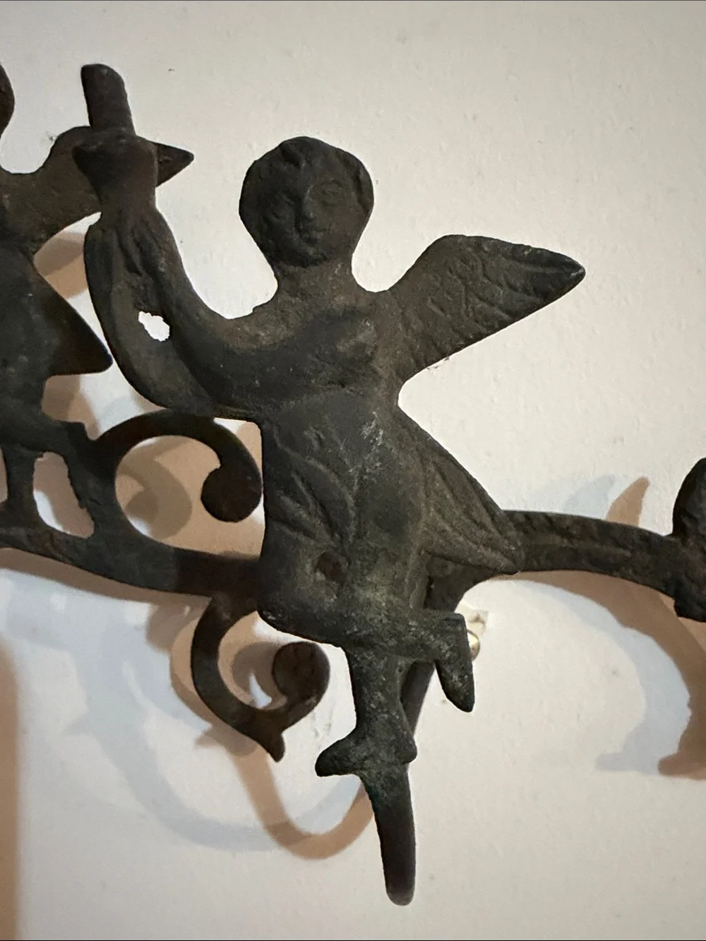Cast iron coat rack with Cherubs. Mid century or earlier?
